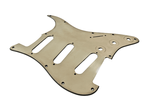 Angle View of an Aged Cream Guitar Pickguard